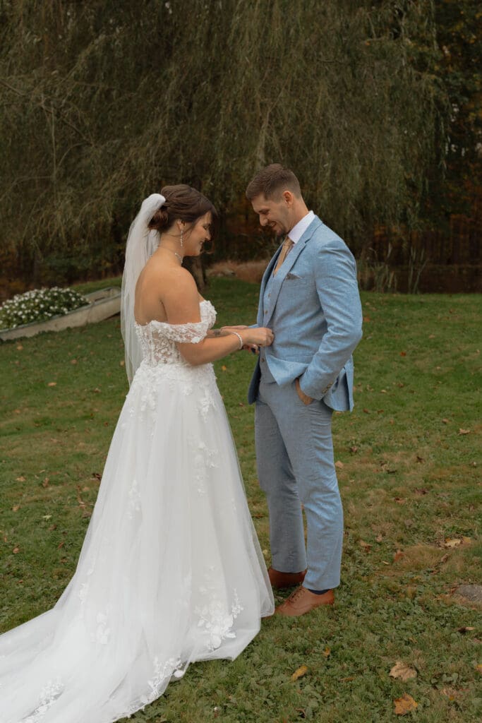 A soon to married couple after their first look admiring eachother